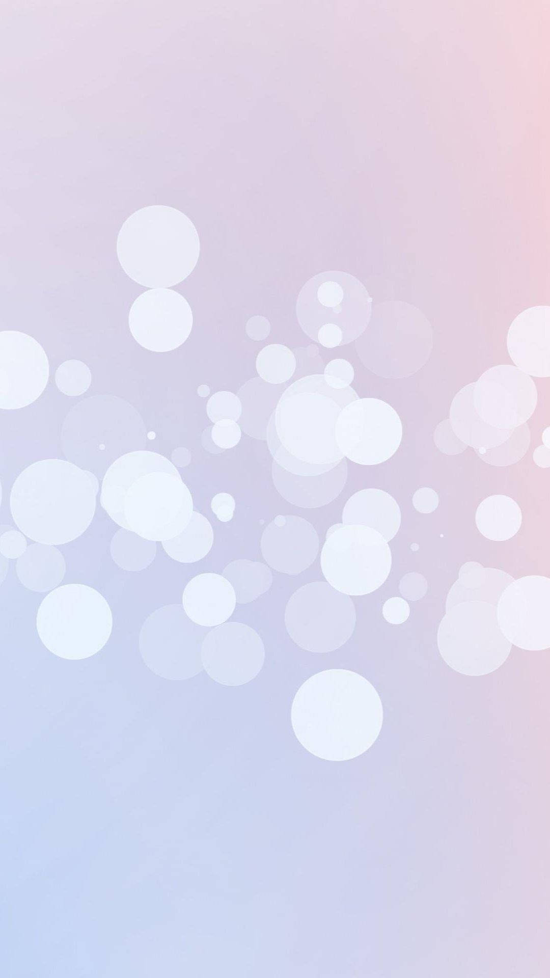 Simple iPhone 桌布 壁紙 — 柔和粉彩漸層背景，散落著發光的散景圓圈，營造出夢幻空靈的氛圍。