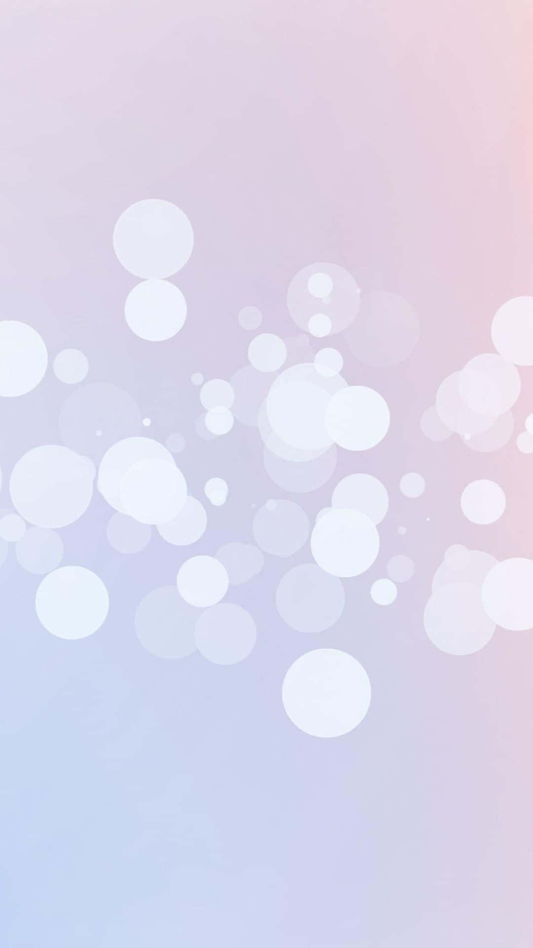 Cute Pattern iPhone 桌布 壁紙 — 柔和粉彩漸變背景，散落著發光的白色散景圓圈，營造出夢幻空靈的效果。