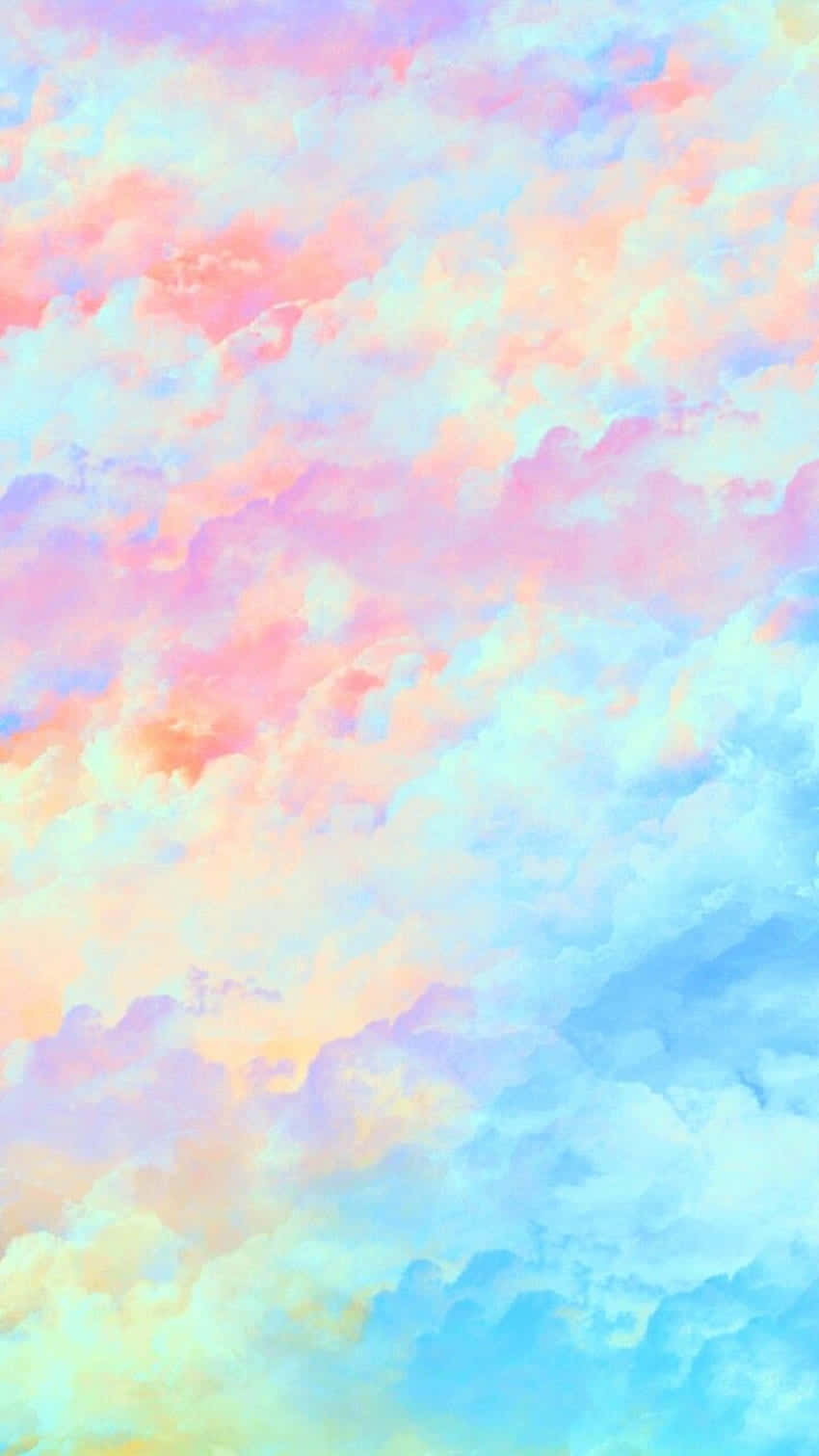 Cute Rainbow 桌布 壁紙 — 柔和粉彩色的雲朵在粉紅、蜜桃和天藍色的漸變中旋轉，形成夢幻的水彩天空。