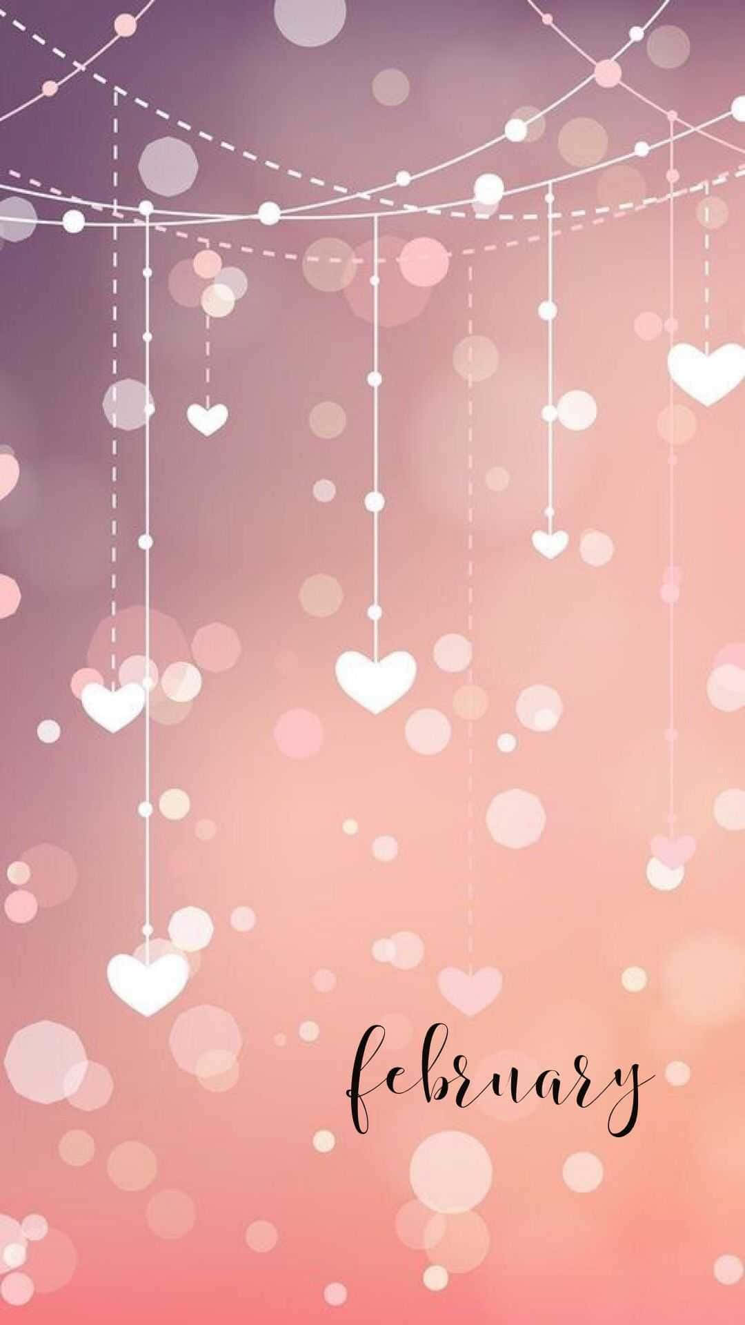 February iPhone 桌布 壁紙 — 柔和粉紅與紫色漸變背景，白色心形從虛線垂下，搭配散景燈光，並有草書字體的february字樣。