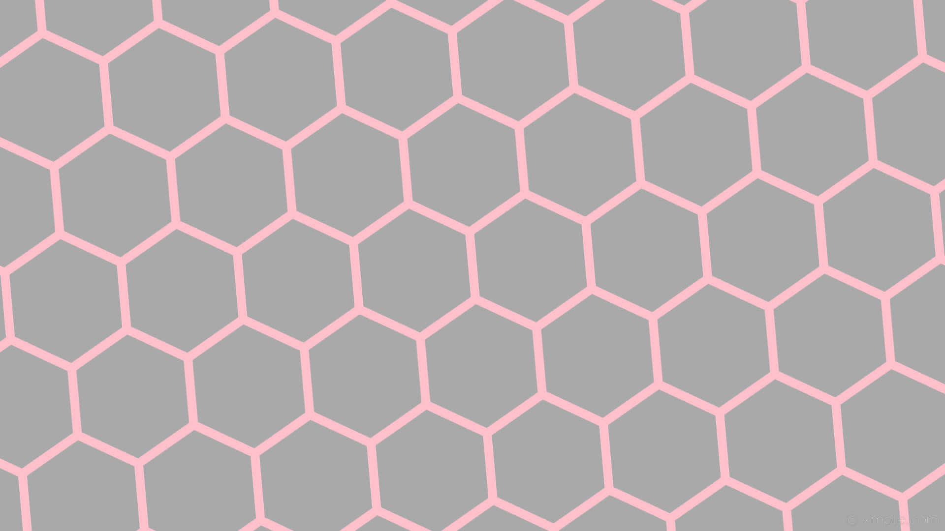 Gray And Pink 桌布 壁紙 — 柔和粉紅色六邊形在柔灰色背景上勾勒出的無縫圖案。