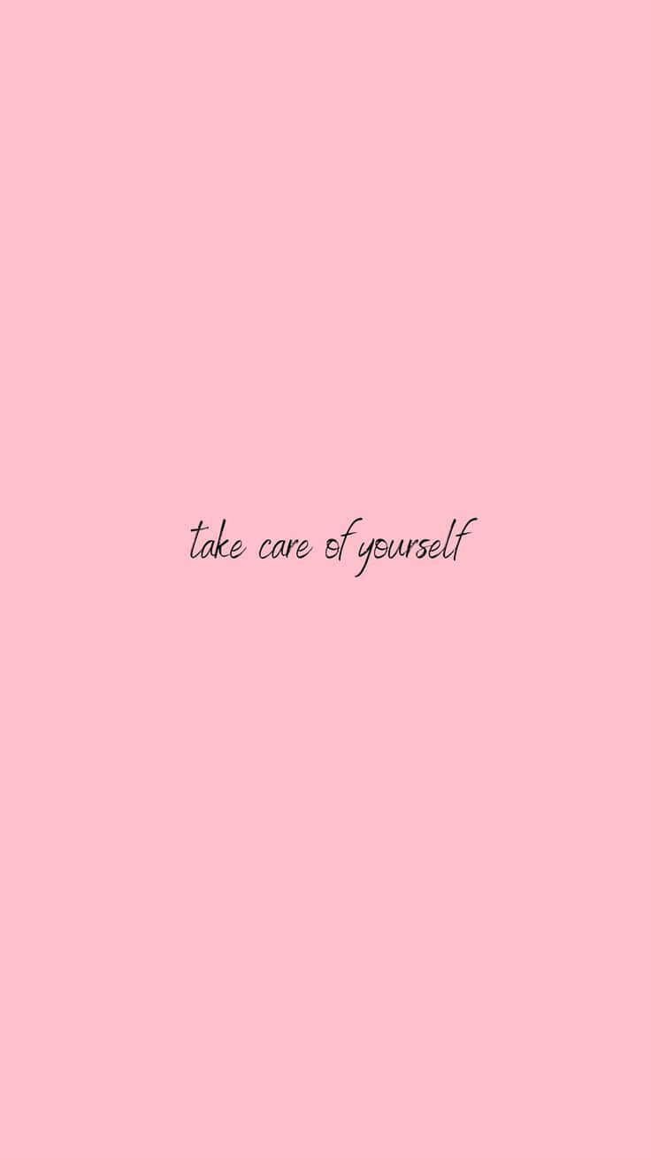 Pink Quote 桌布 壁紙 — 柔和粉紅色背景，上面用優雅的黑色草書寫著 take care of yourself。