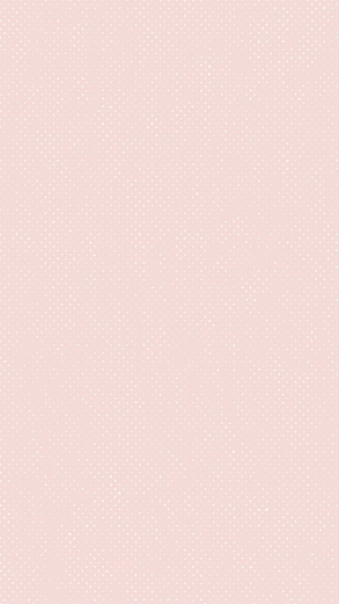 Pastel Peach Aesthetic 桌布 壁紙 — 柔和粉紅色背景，帶有精緻白色圓點，營造出溫柔簡約的圖案。