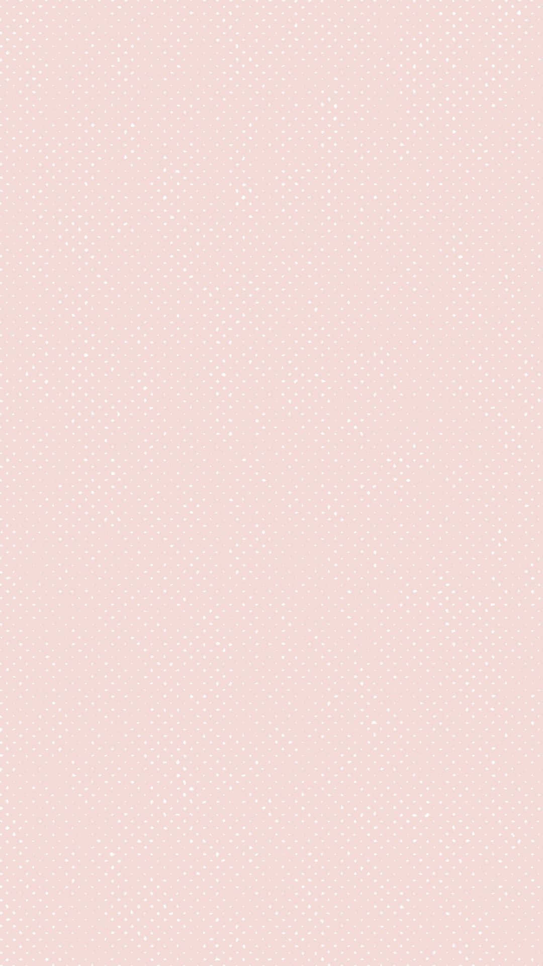 Light Pink iPhone 桌布 壁紙 — 柔和粉紅色背景，帶有細微白色圓點，營造出溫柔簡約圖案。