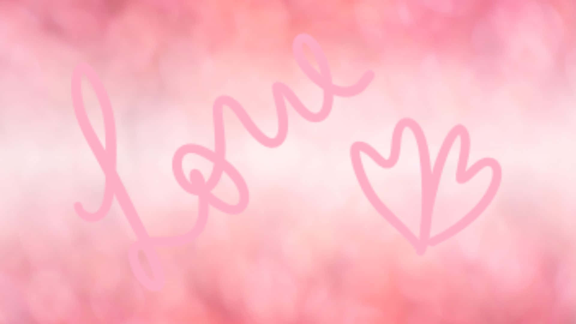 Pink Love 桌布 壁紙 — 柔和粉紅色草書字體「love」，帶有心形輪廓，襯托夢幻模糊花卉背景。