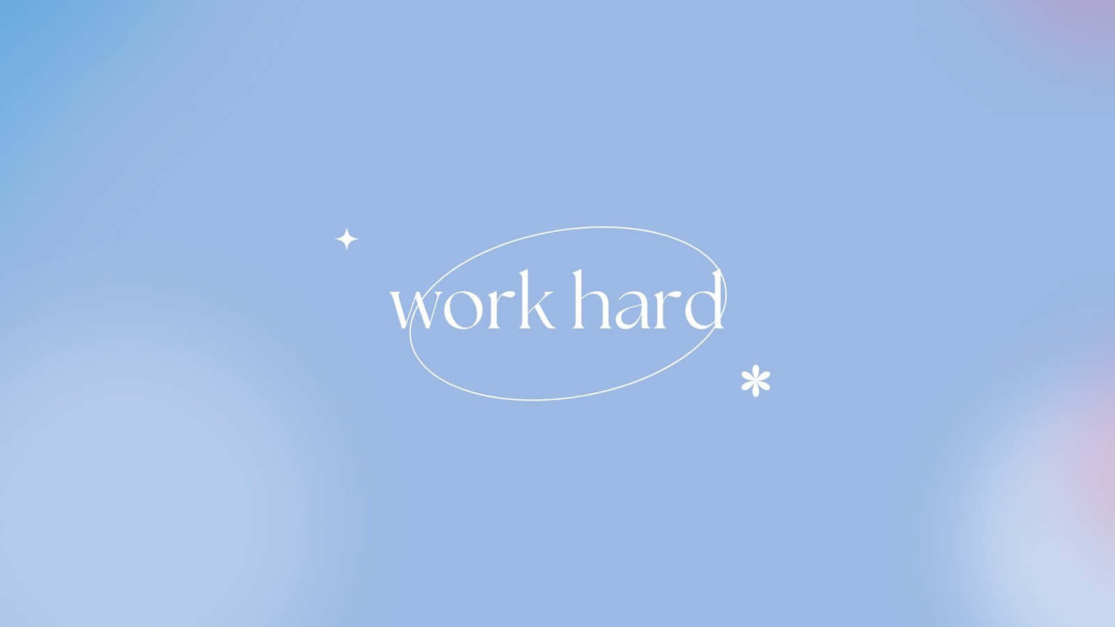 Pastel Blue 桌布 壁紙 — 柔和粉藍色漸變背景，白色文字 work hard 被一個細橢圓形包圍，並帶有星星和花朵裝飾。