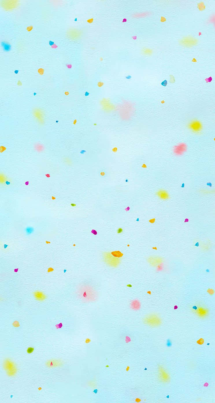 Confetti 桌布 壁紙 — 柔和粉藍色背景，散落著色彩繽紛的水彩潑濺和柔軟的筆觸。