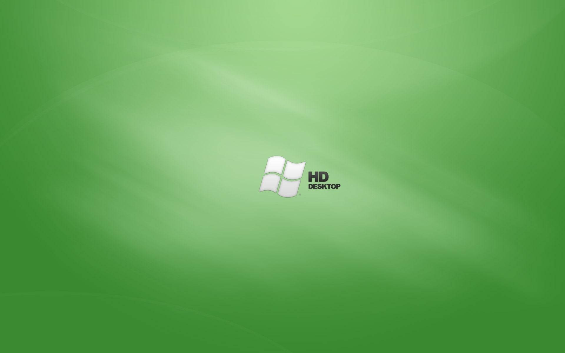 微軟桌面 桌布 壁紙 — 柔和綠色漸層桌布，中央帶有Windows標誌和HD Desktop文字。