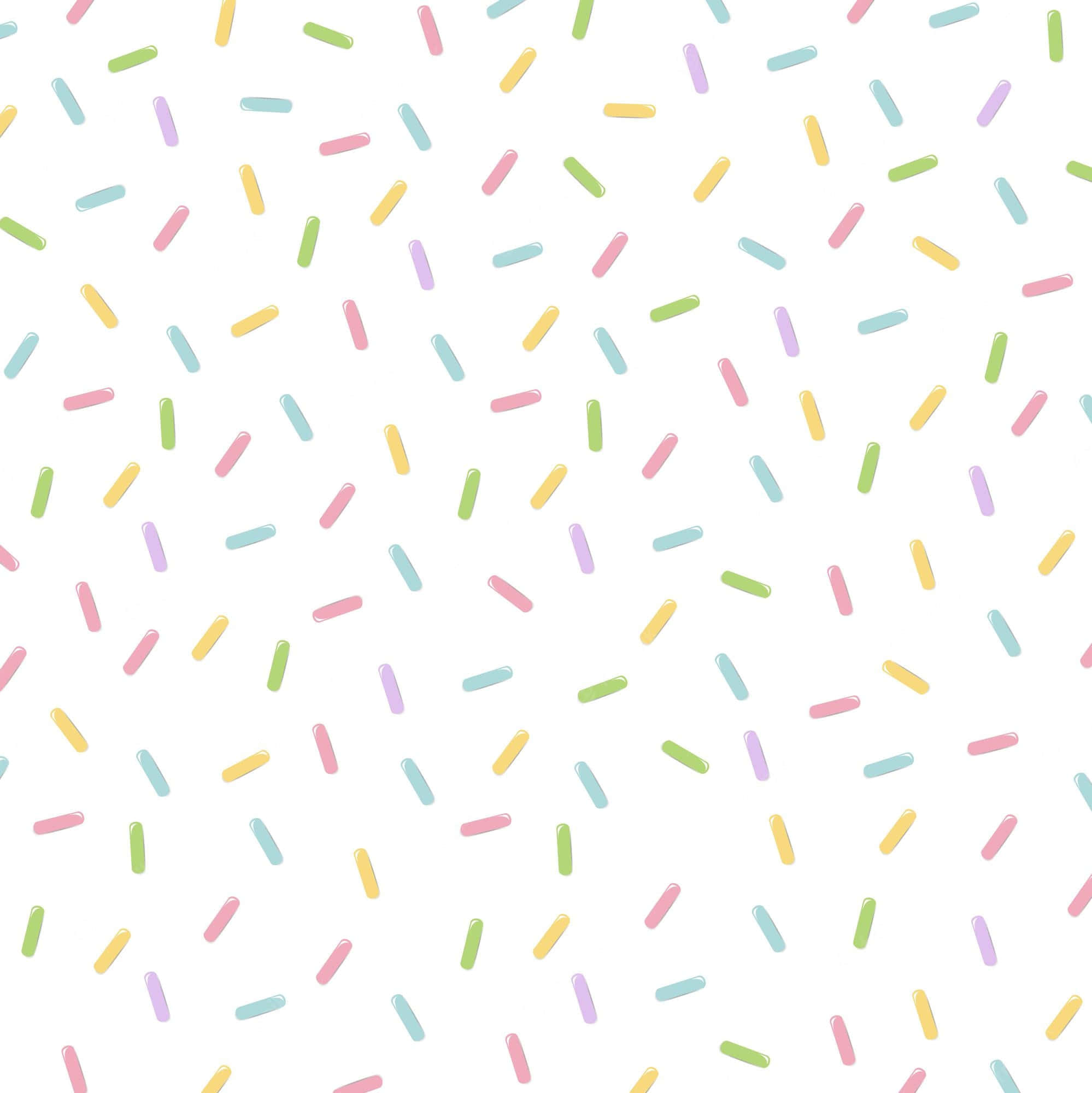 Sprinkle 桌布 壁紙 — 柔和色彩的糖果灑在潔白背景上，形成俏皮的重複圖案。