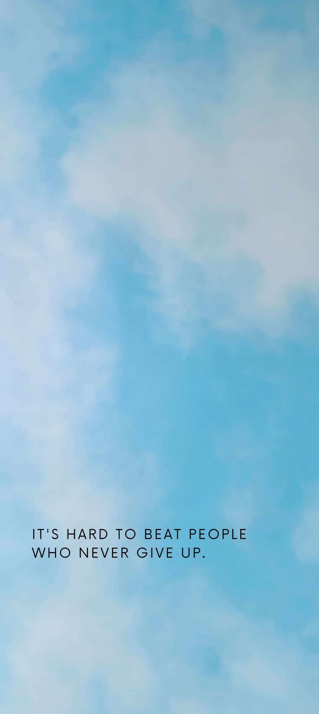 1080x2412 桌布 壁紙 — 柔和藍天配上薄雲，以及關於堅持的勵志名言。