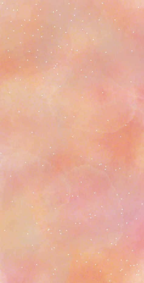 Peachy Aesthetic 桌布 壁紙 — 柔和蜜桃與粉紅色水彩洗滌，散落白色點點，宛如星星或塵埃。