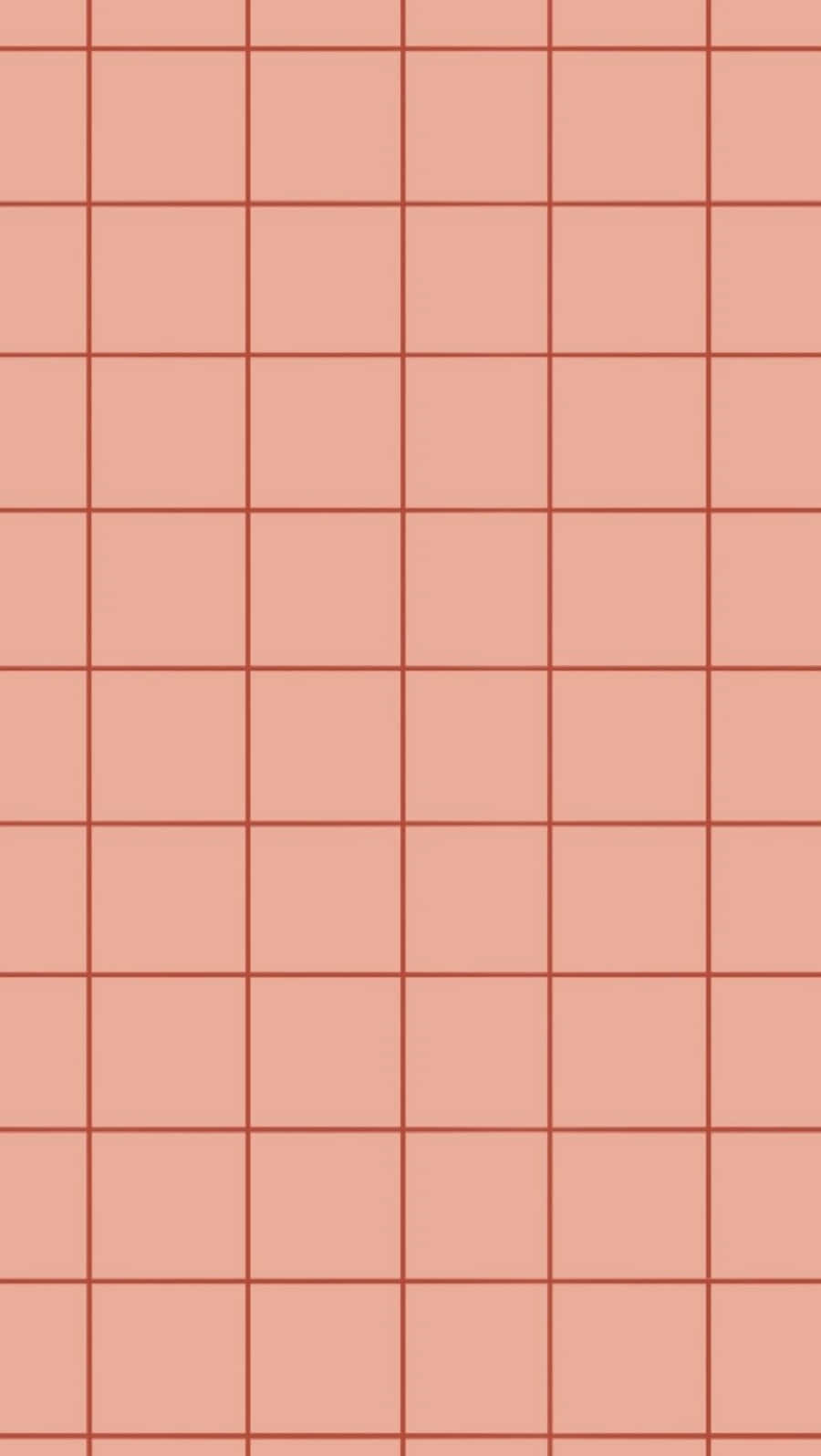 Pastel Aesthetic Grid 桌布 壁紙 — 柔和蜜桃色與陶土色調的極簡網格圖案，營造出平靜的幾何壁紙。