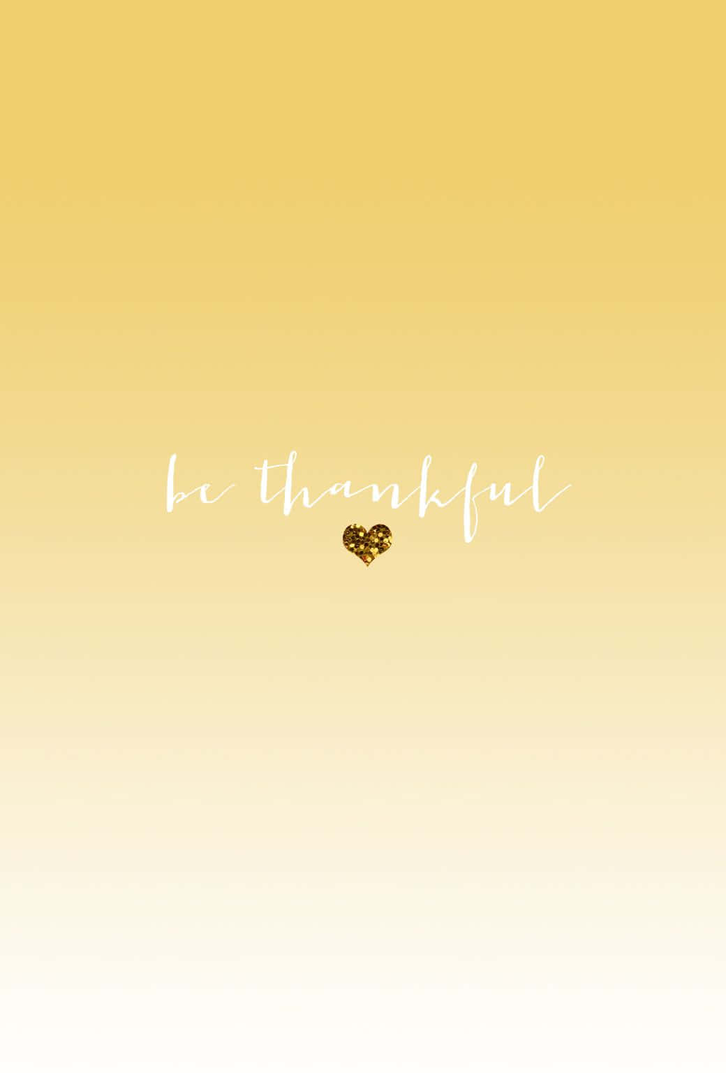 Yellow 桌布 壁紙 — 柔和黃色漸變背景上，以優雅白色手寫字體呈現「be thankful」字句，下方有一顆閃爍金色心形。