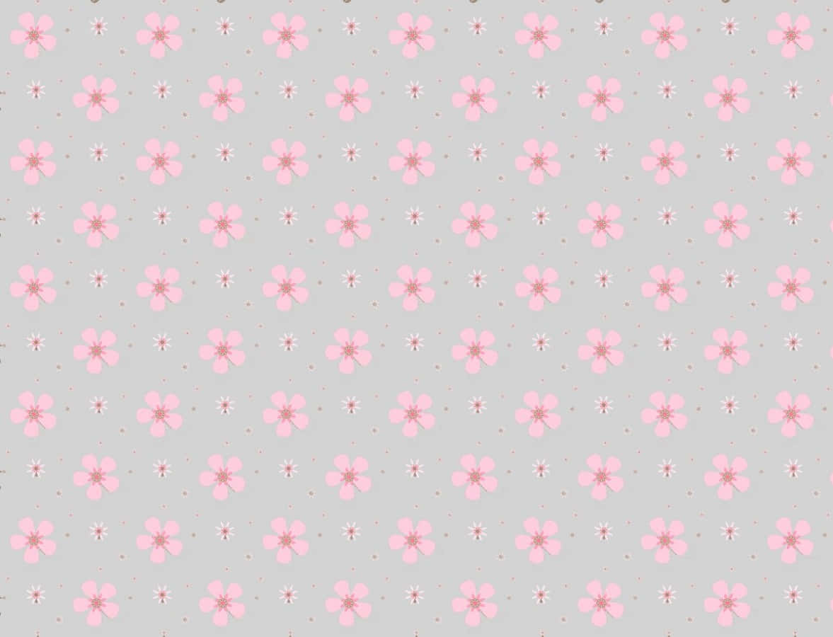 Gray And Pink 桌布 壁紙 — 柔軟灰色壁紙，飾有重複的細膩粉紅花朵和細小白色星爆圖案。