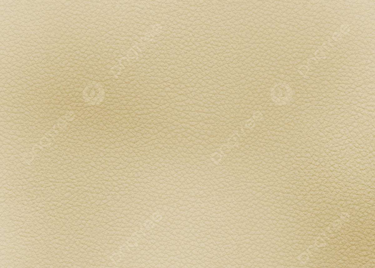 Beige Pastel 桌布 壁紙 — 柔軟燈光下平滑米色皮革的細微紋理特寫。