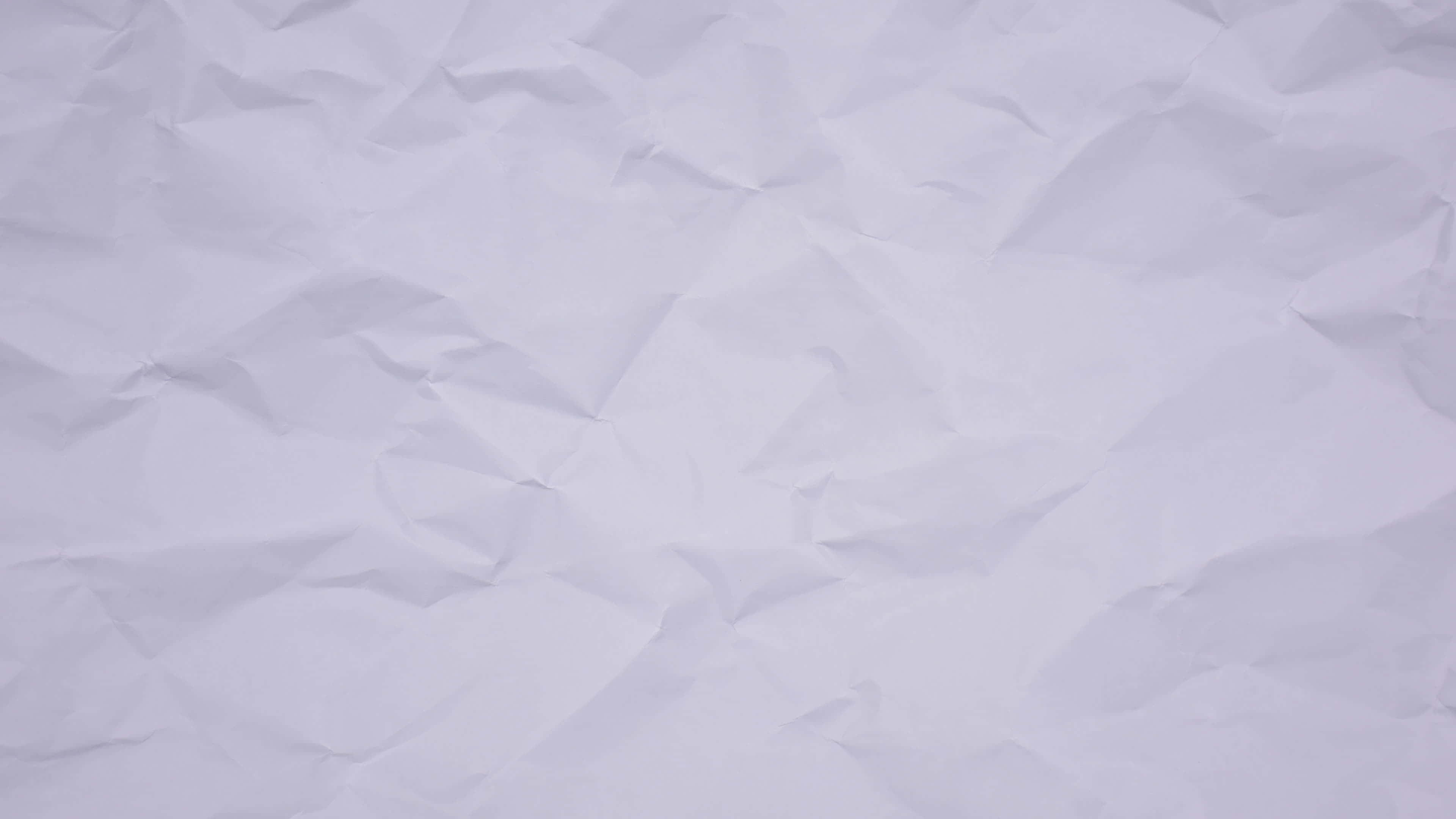 paper 桌布 壁紙 — 柔軟白色皺紙的特寫，帶有柔和陰影和紋理摺痕。