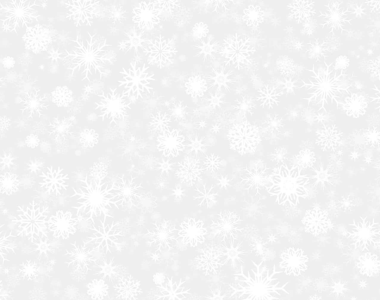 Snowing 桌布 壁紙 — 柔軟的灰色背景，上面佈滿了各種精緻複雜設計和尺寸的白色雪花。