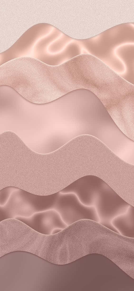 Rose Gold Color 桌布 壁紙 — 柔軟的玫瑰金波浪織物層，帶有緞面光澤和柔和漸變，營造出奢華的抽象質感。