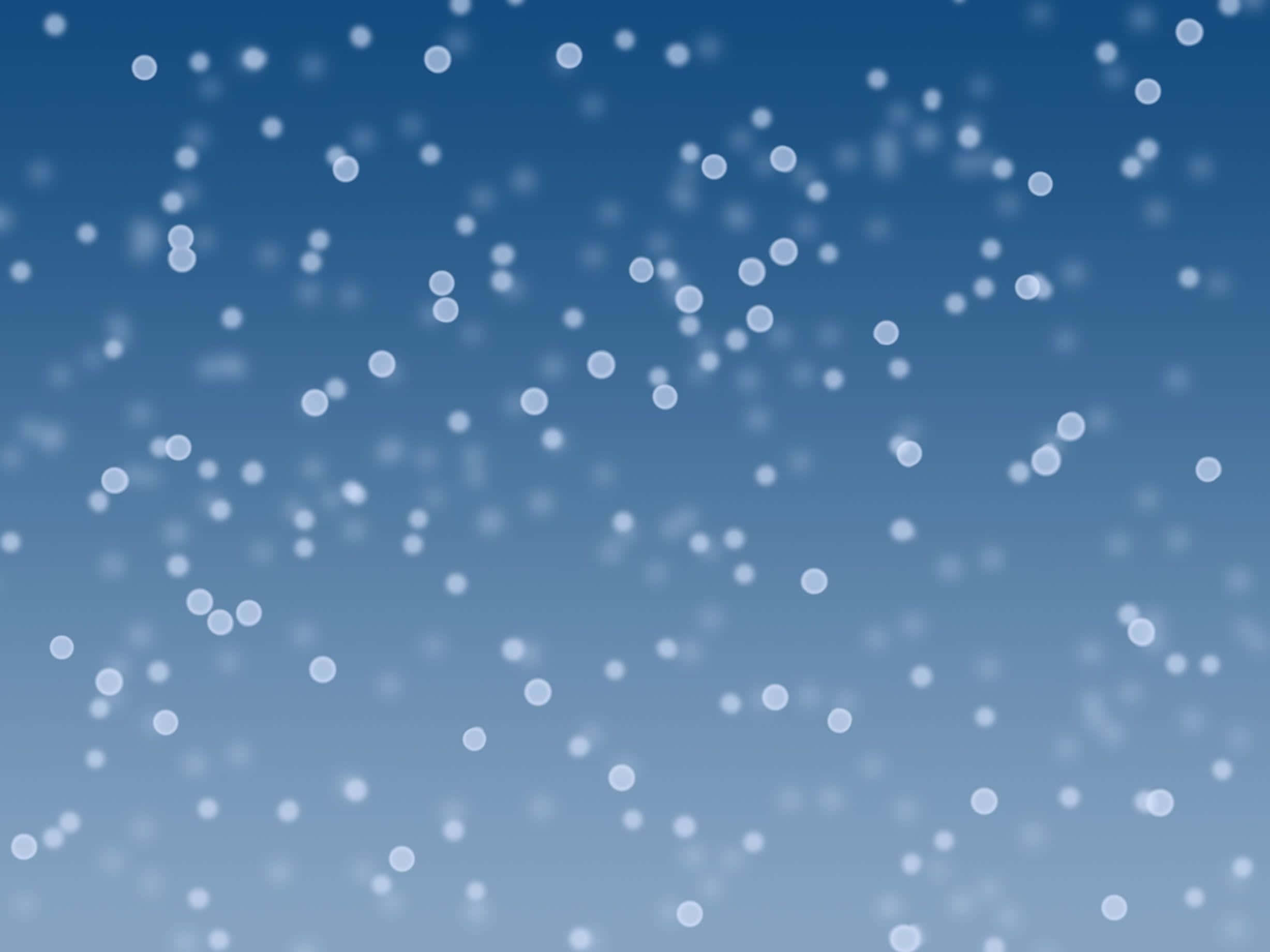 Snowing 桌布 壁紙 — 柔軟的白色雪花輕輕飄過寧靜的漸變藍色天空。