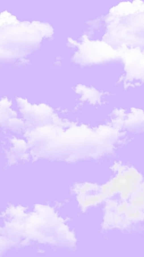 Clouds Aesthetics 桌布 壁紙 — 柔軟的白雲懶洋洋地飄過夢幻的薰衣草天空，營造出寧靜的粉彩桌布。