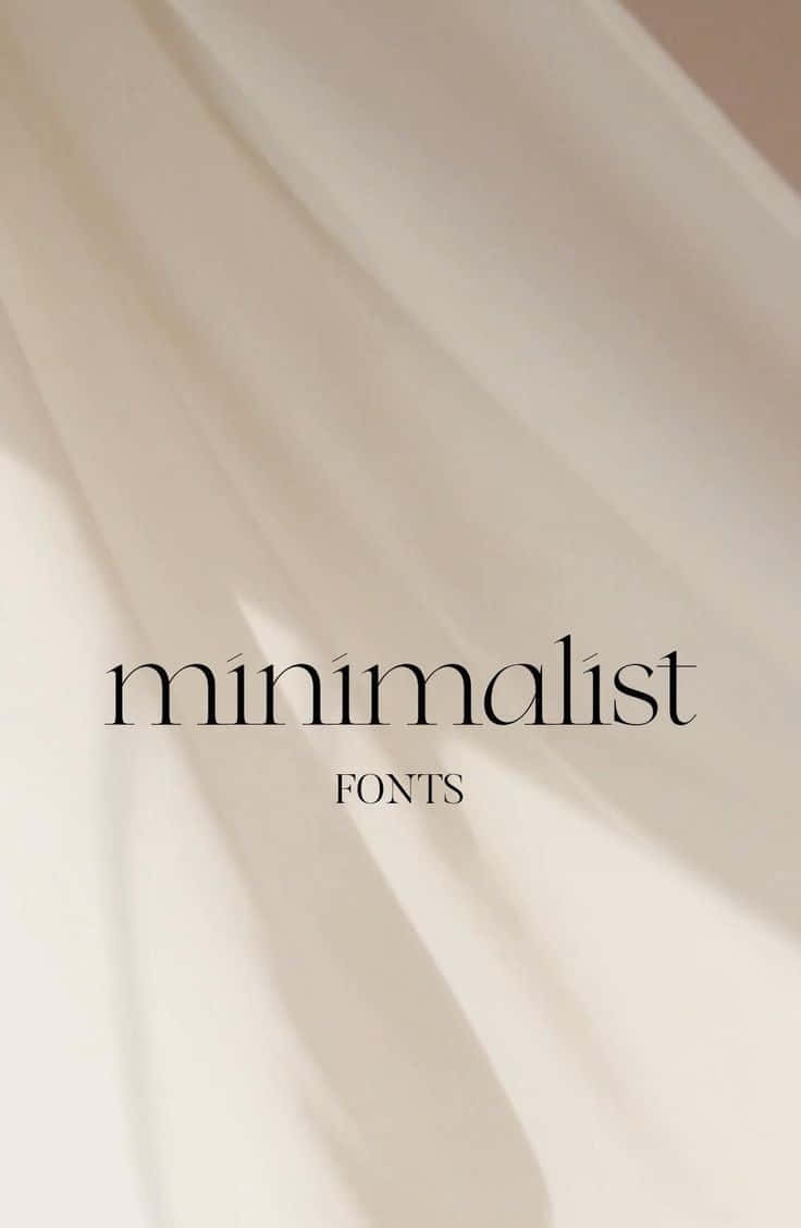 Minimalist Typography 桌布 壁紙 — 柔軟的米色布料以柔和褶皺和微妙陰影垂墜，營造寧靜的極簡美學。
