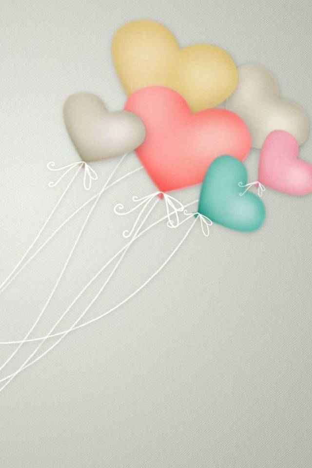 Balloon 桌布 壁紙 — 柔軟的粉彩色心形氣球，帶著精緻的白色繩索，輕輕漂浮在有紋理的灰色背景上。