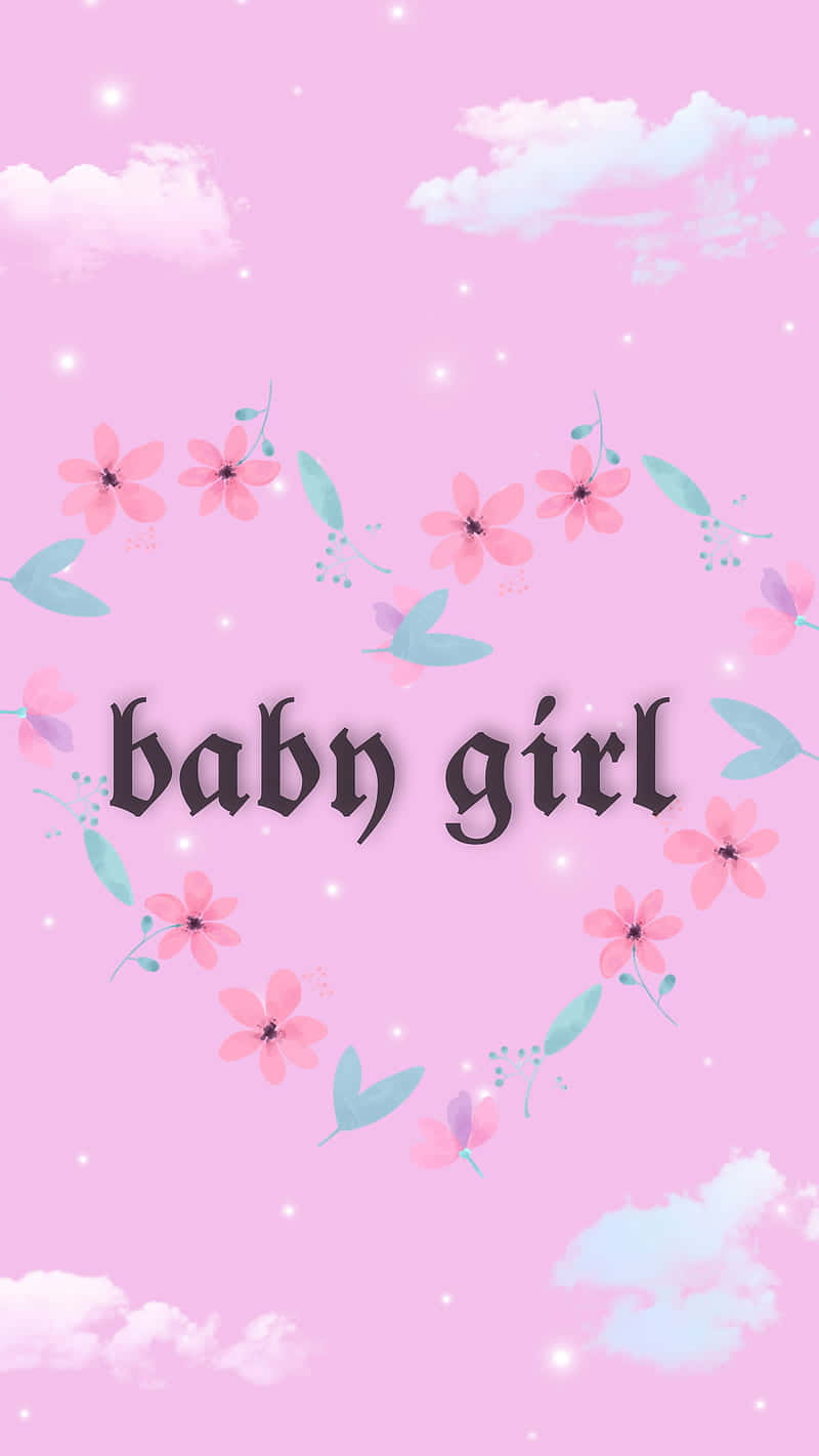 桌布 壁紙 — 柔軟的粉紅色壁紙，帶有花卉心形框架和「baby girl」文字，背景是天空、雲朵和閃爍的光芒。