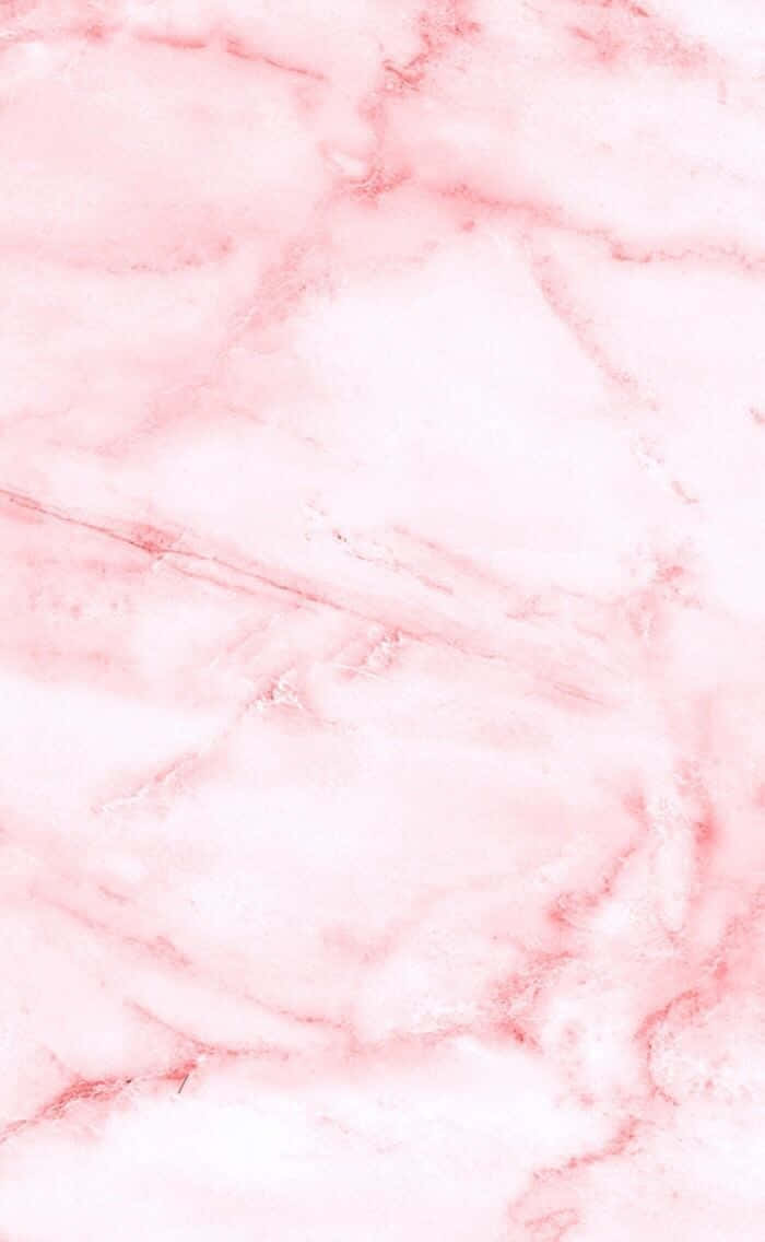 Marble Pink 桌布 壁紙 — 柔軟的粉紅色大理石，帶有細膩紋理和光滑質感，營造出奢華而平靜的視覺效果。