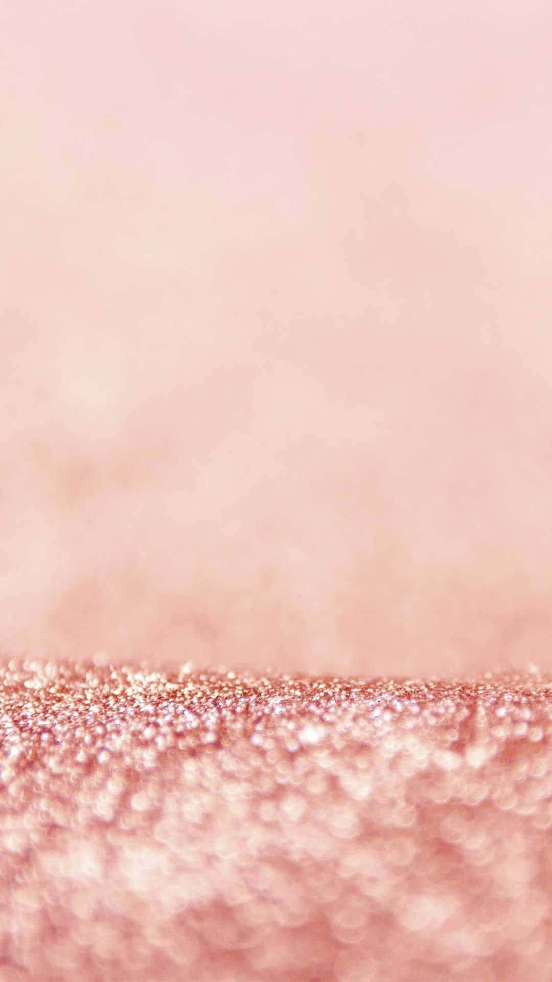 Aesthetic Rose Gold 桌布 壁紙 — 柔軟的粉紅色漸變背景，底部帶有閃亮的玫瑰金散景紋理。