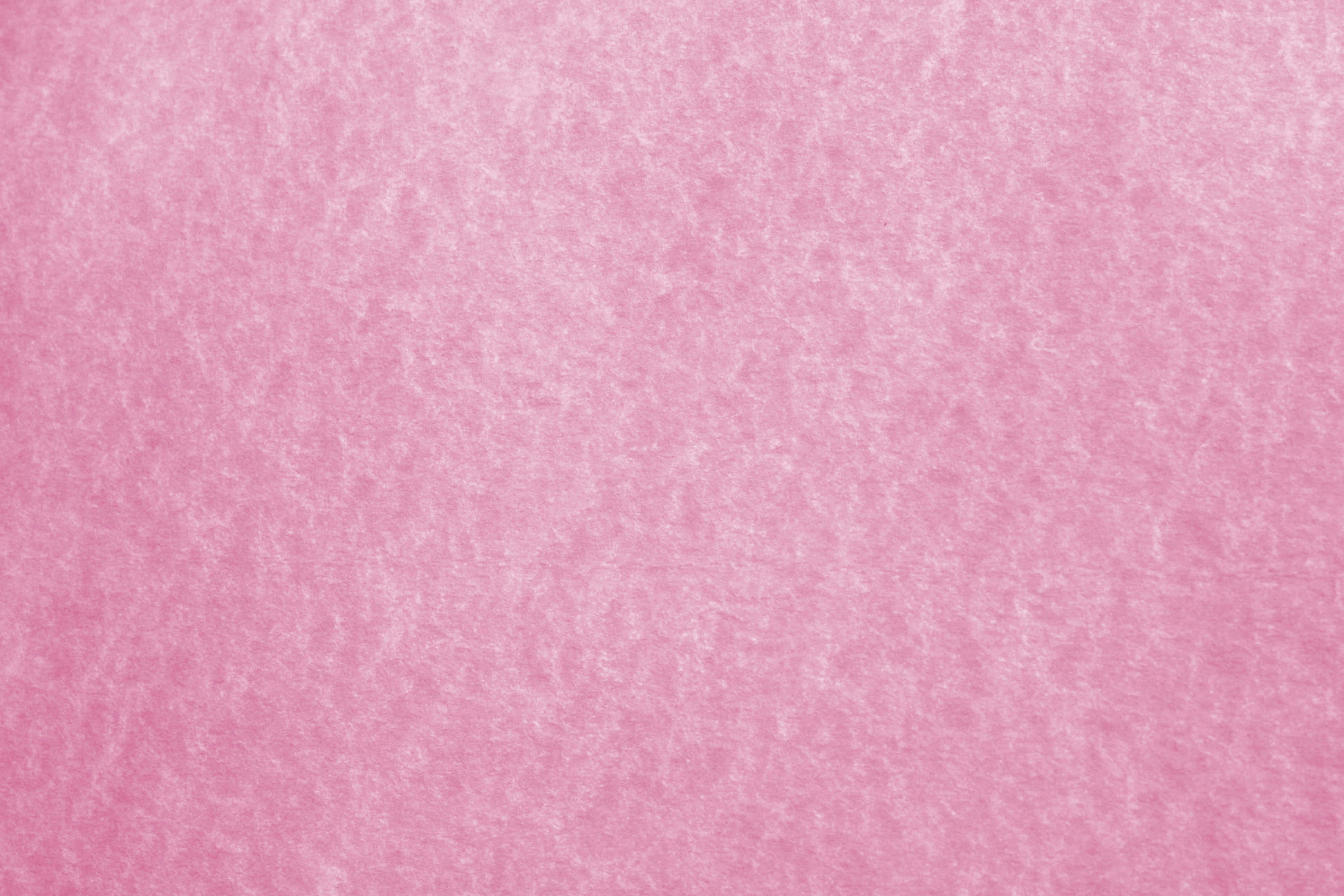 Pink Texture 桌布 壁紙 — 柔軟的粉紅色紋理表面，色調變化細微，帶有溫和的纖維狀圖案。