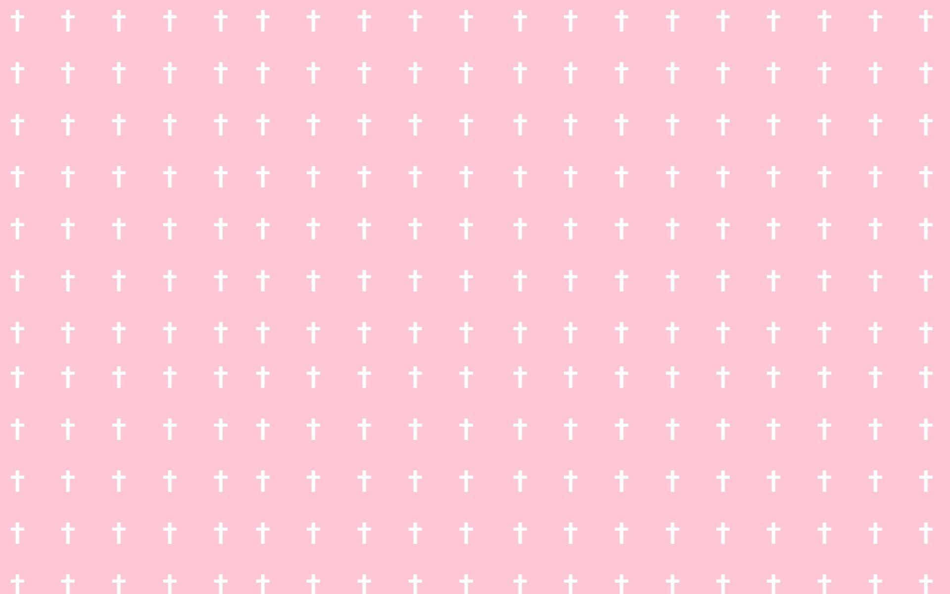 Kawaii Pink Aesthetic Desktop 桌布 壁紙 — 柔軟的粉紅色背景，上面有細小白色十字架整齊排列的重複圖案。