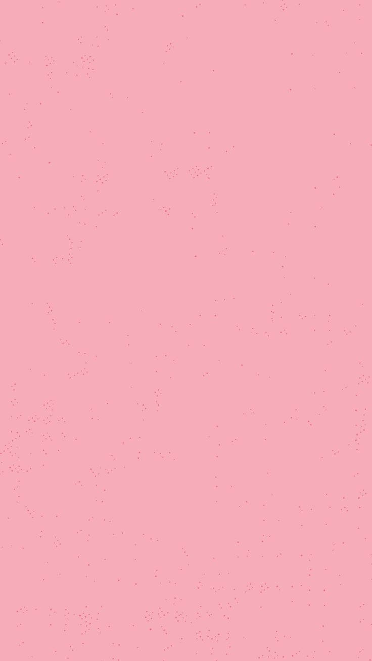 Plain Pink 桌布 壁紙 — 柔軟的粉紅色背景，帶有細微的斑點紋理，呈現極簡美學。
