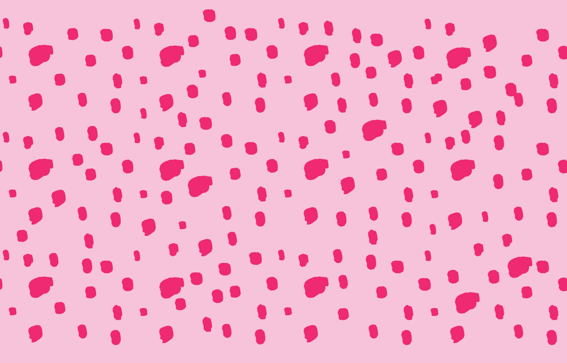 Minimalist Pink 桌布 壁紙 — 柔軟的粉紅色背景，點綴著散落的鮮豔洋紅色筆觸點，營造出玩味的抽象圖案。