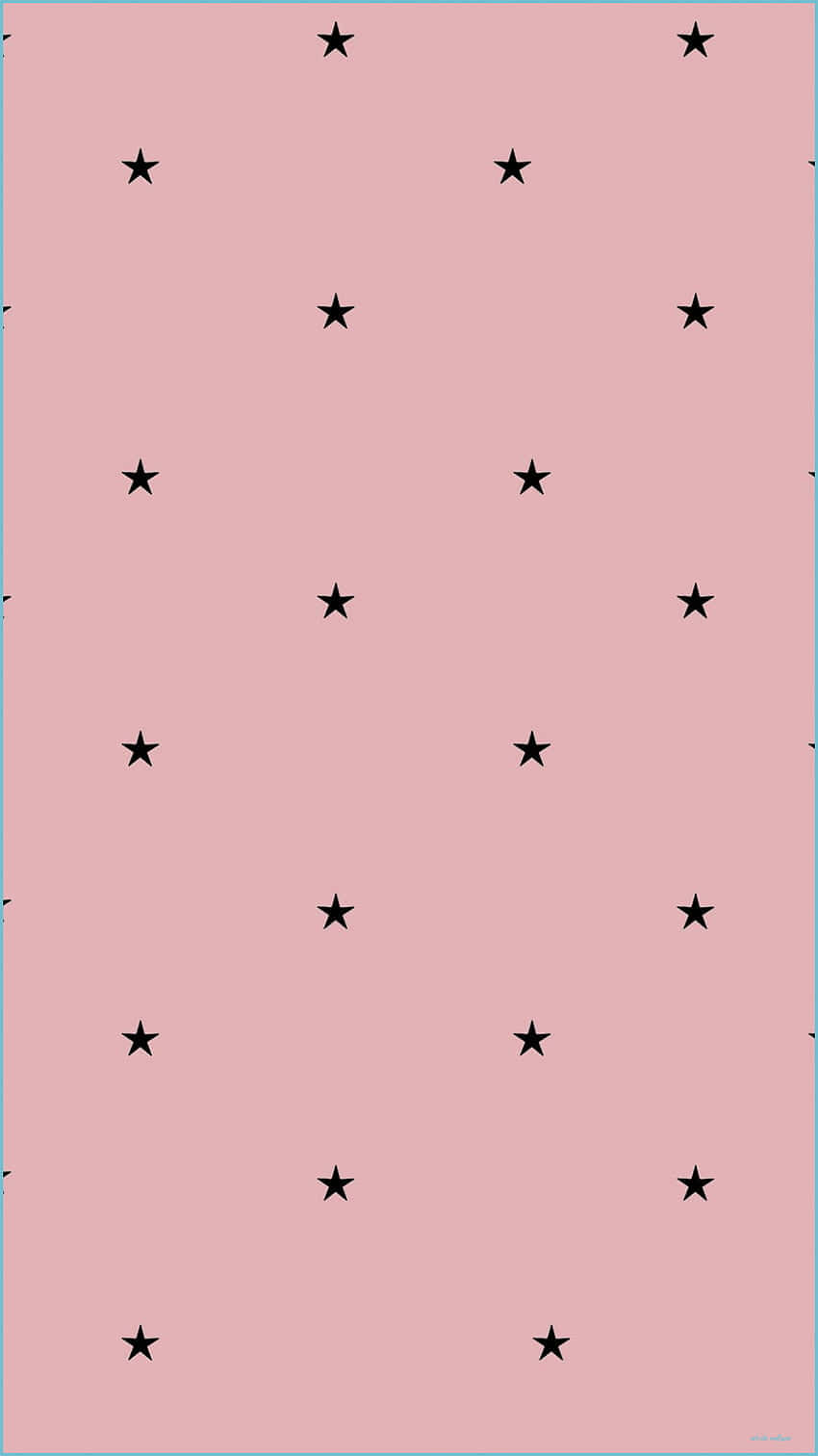 Stars 桌布 壁紙 — 柔軟的粉紅色背景，點綴著散落的黑色星星，形成極簡圖案。