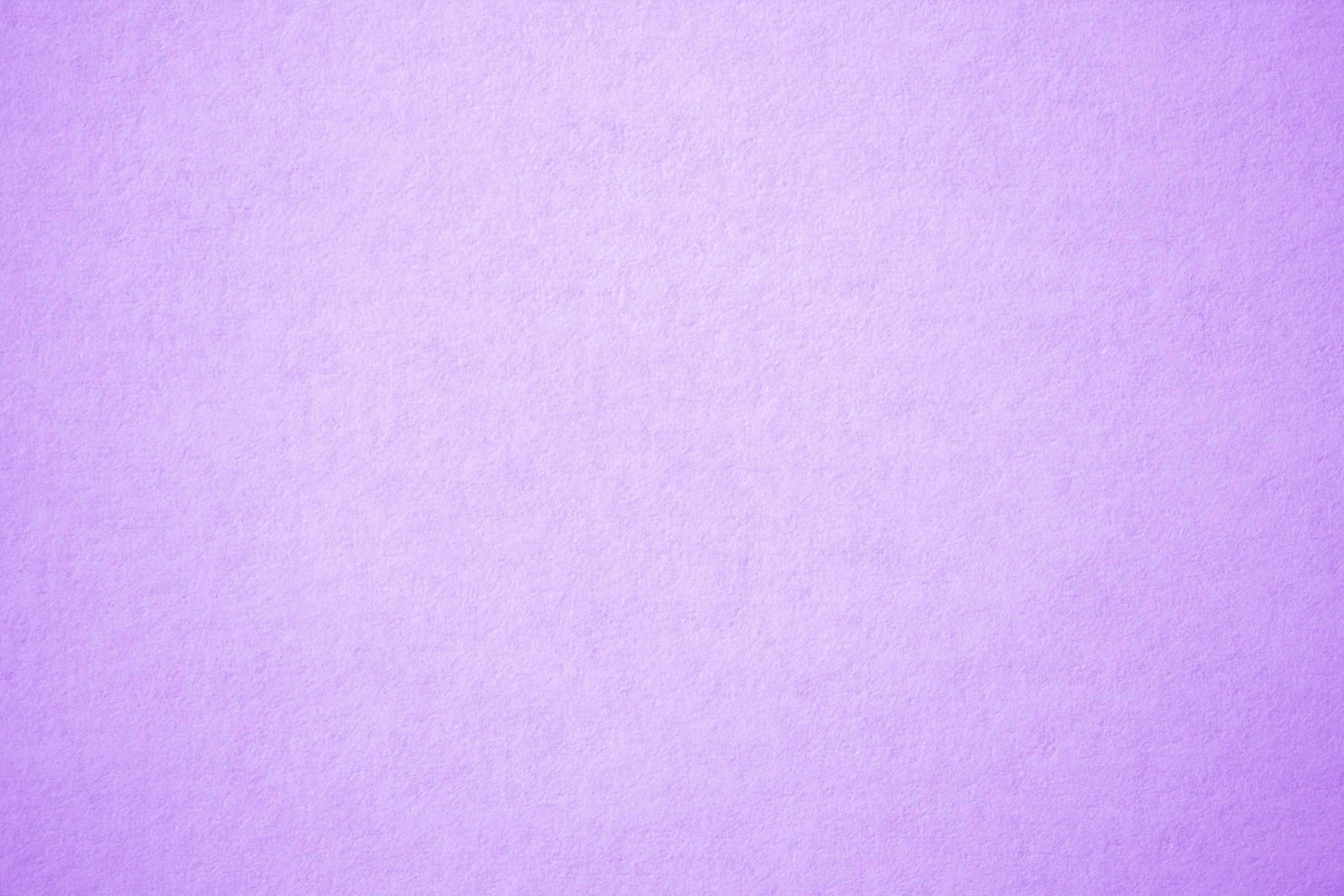 Solid Light Purple 桌布 壁紙 — 柔軟的薰衣草紋理紙，表面帶有細微紋理和柔和漸變。