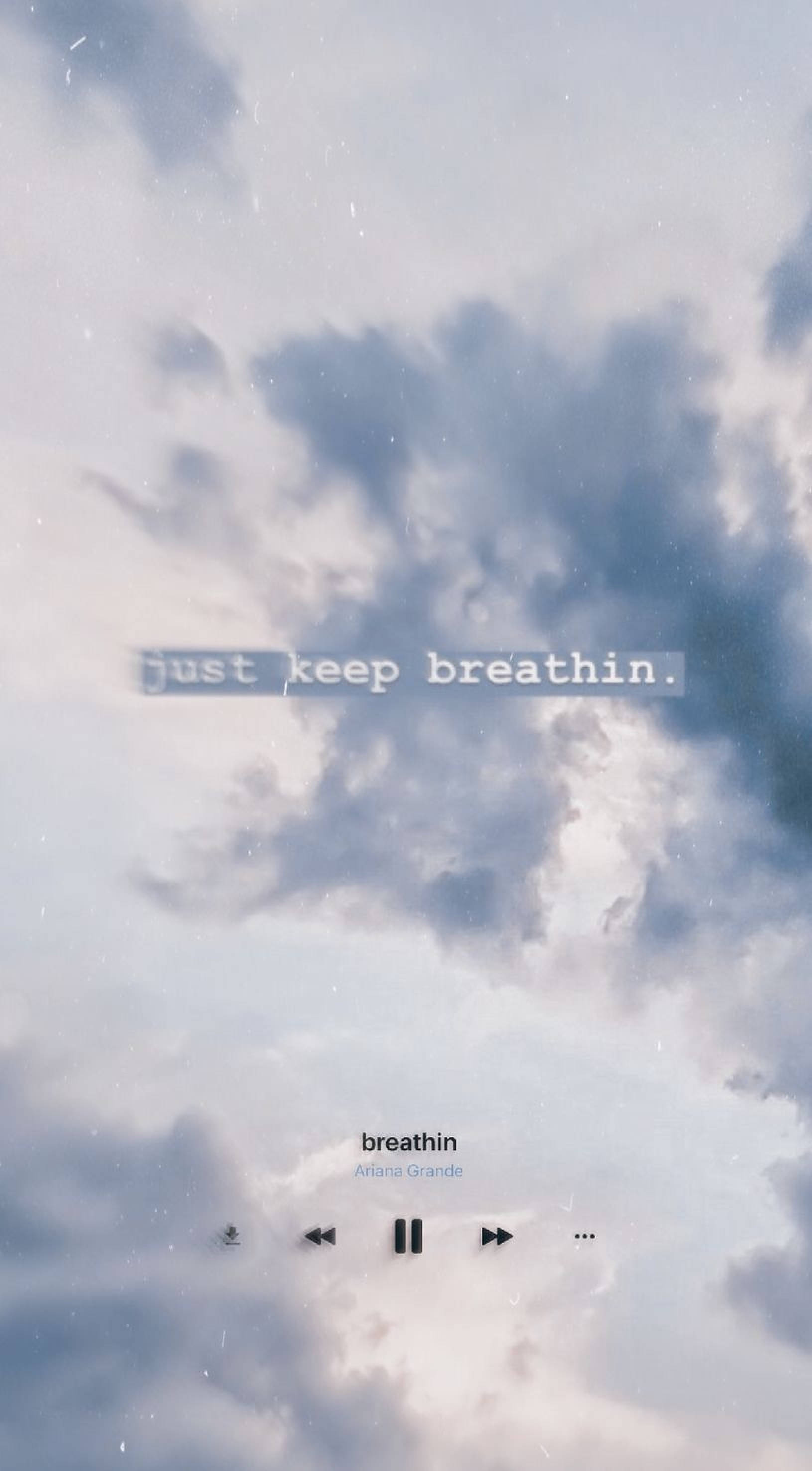 Breathing 桌布 壁紙 — 柔軟的雲朵在淡色天空飄過，上面疊加了簡約音樂播放器界面和文字 just keep breathin。