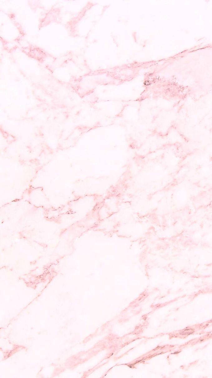 Pink Marble 桌布 壁紙 — 柔軟粉紅與白色大理石的近距離特寫，帶有流動的自然紋理圖案。