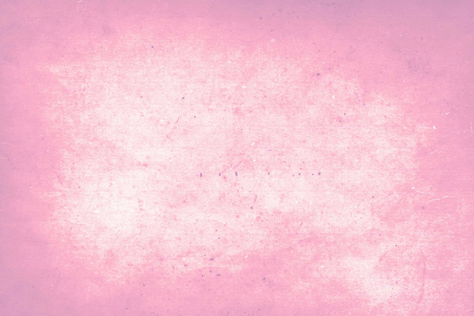 Pink Texture 桌布 壁紙 — 柔軟粉紅色紋理壁紙，帶有細微刮痕和褪色白色斑塊，營造出復古破舊的外觀。