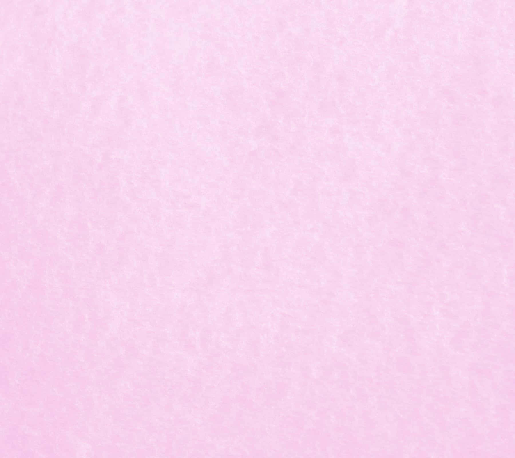 Blush Pink 桌布 壁紙 — 柔軟紋理的淺粉紅色背景，帶有微妙的斑駁圖案和柔和的色調變化。