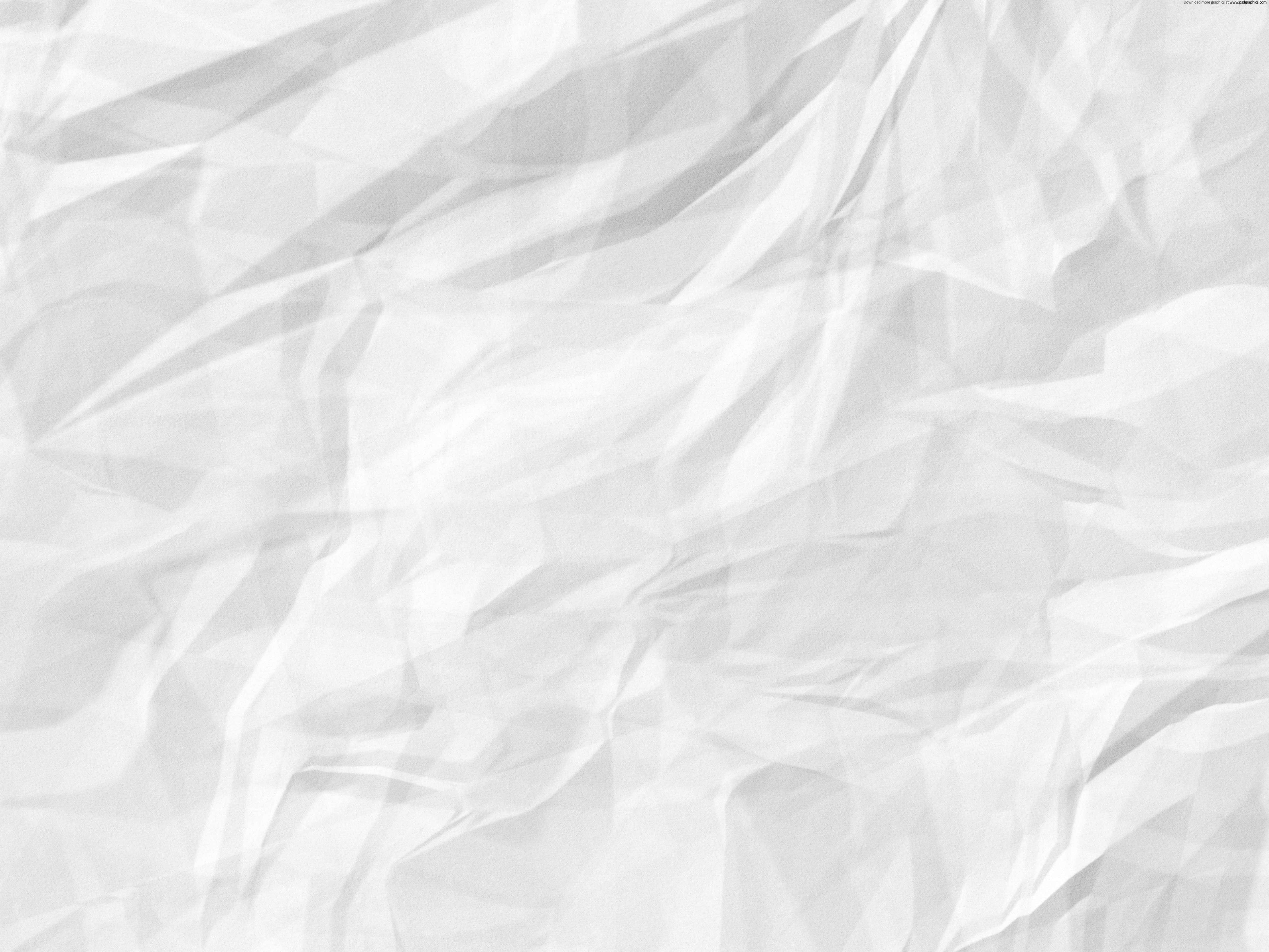 White Paper 桌布 壁紙 — 柔軟質感白色皺紙的特寫，柔和陰影與高光營造出極簡抽象圖案。