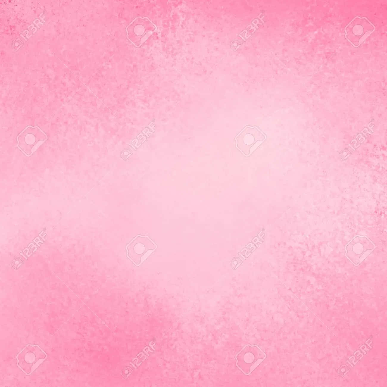 Pink Solid Color 桌布 壁紙 — 柔軟質感的粉紅色水彩洗滌，帶有微妙的漸變和斑點狀的筆觸效果。