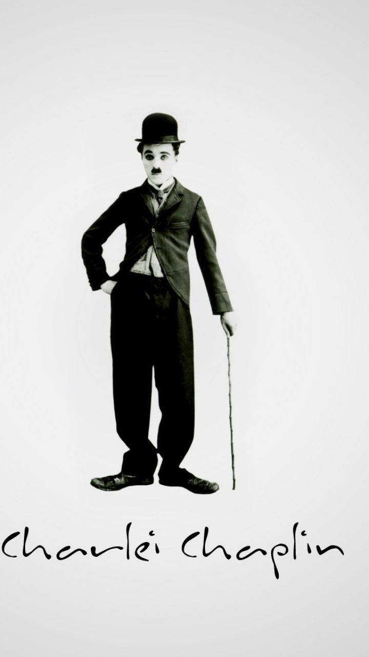 Chaplin 桌布 壁紙 — 查理·卓別林的經典黑白肖像，戴著標誌性的圓頂禮帽，手持手杖，背景簡潔。