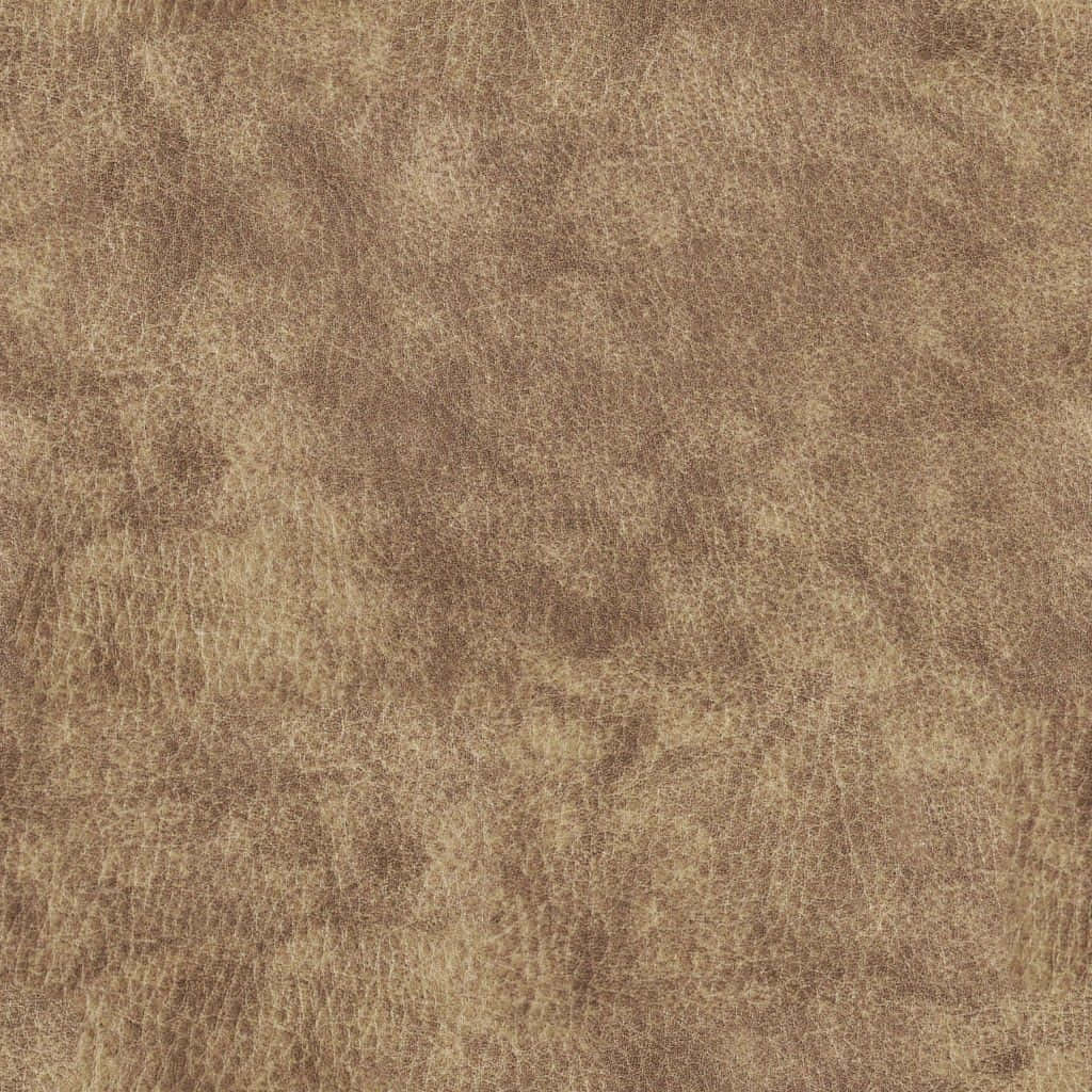 texture 桌布 壁紙 — 棕色皮革表面的特寫，具有紋理、天然紋理和微妙的色調變化。