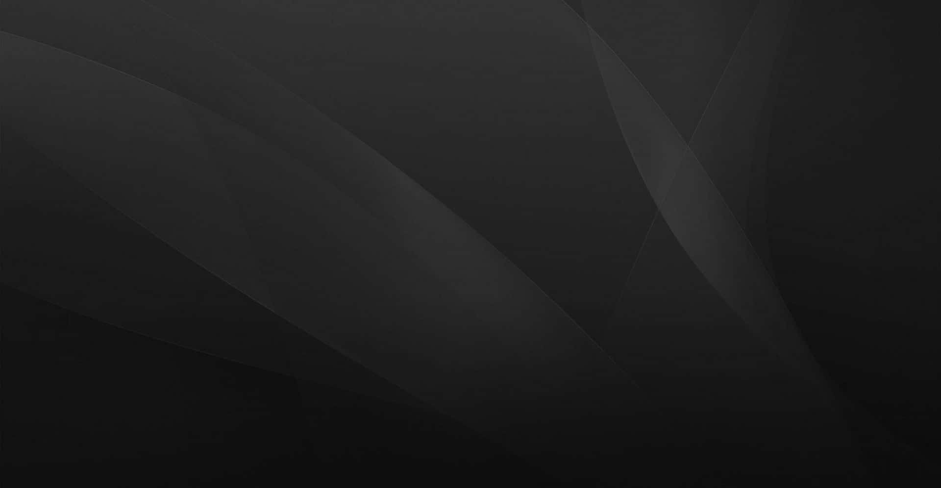 Black And Gray 桌布 壁紙 — 極簡抽象背景，採用炭灰色和深黑色的柔和漸變，營造出流動的對角線形狀。