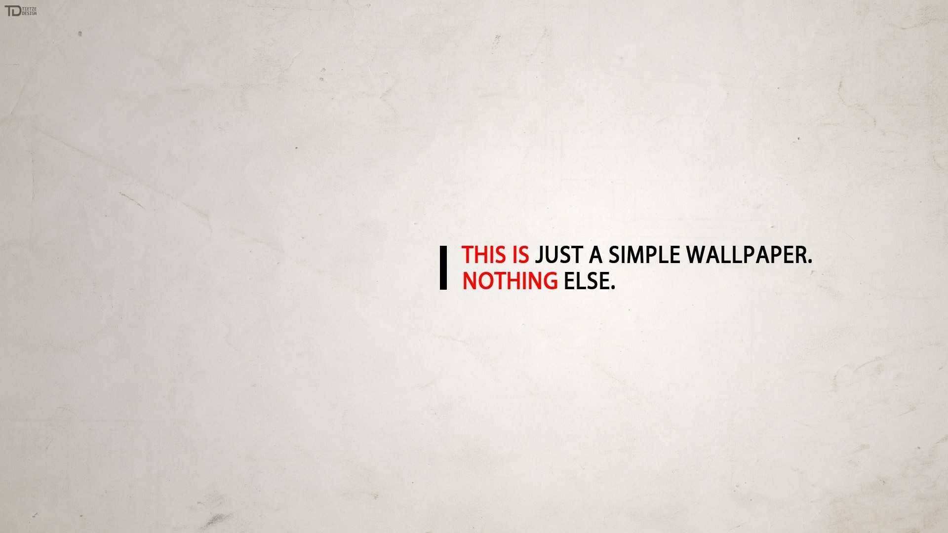 極簡桌面 桌布 壁紙 — 極簡文字顯示「THIS IS JUST A SIMPLE WALLPAPER. NOTHING ELSE.」，以紅色和黑色呈現在有紋理的米白色背景上。