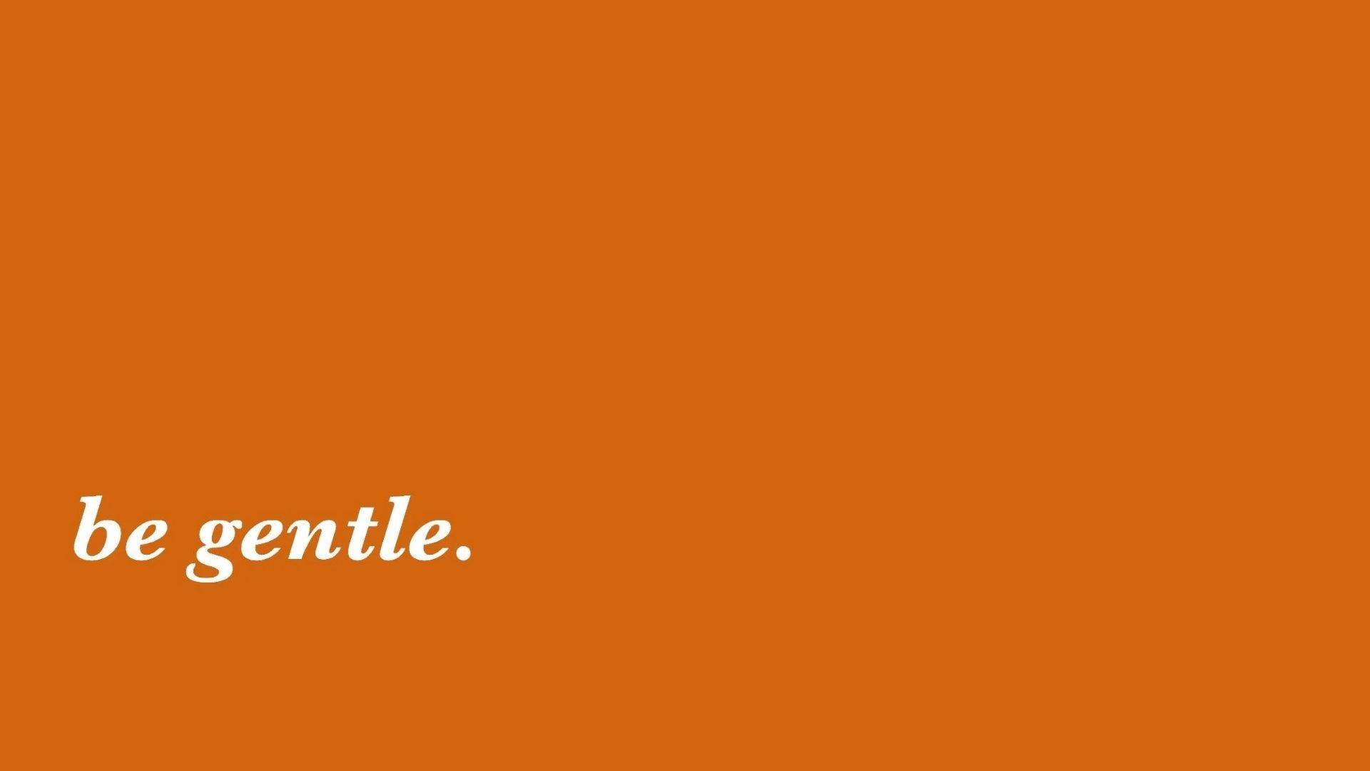 Orange 桌布 壁紙 — 極簡橙色背景，白色草書文字寫著 be gentle。