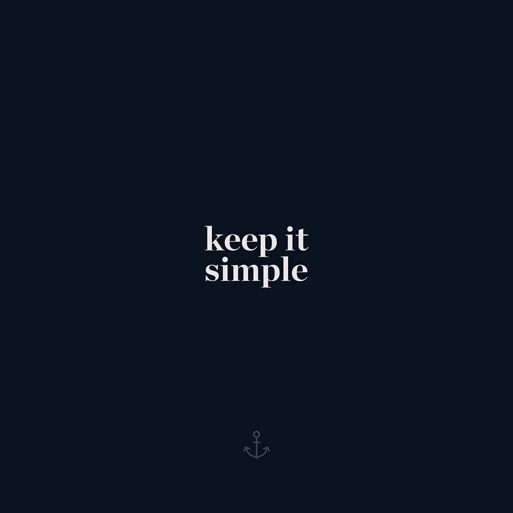  壁紙 — 極簡深海軍藍背景，中央白色文字 keep it simple，下方有一個小錨圖示。