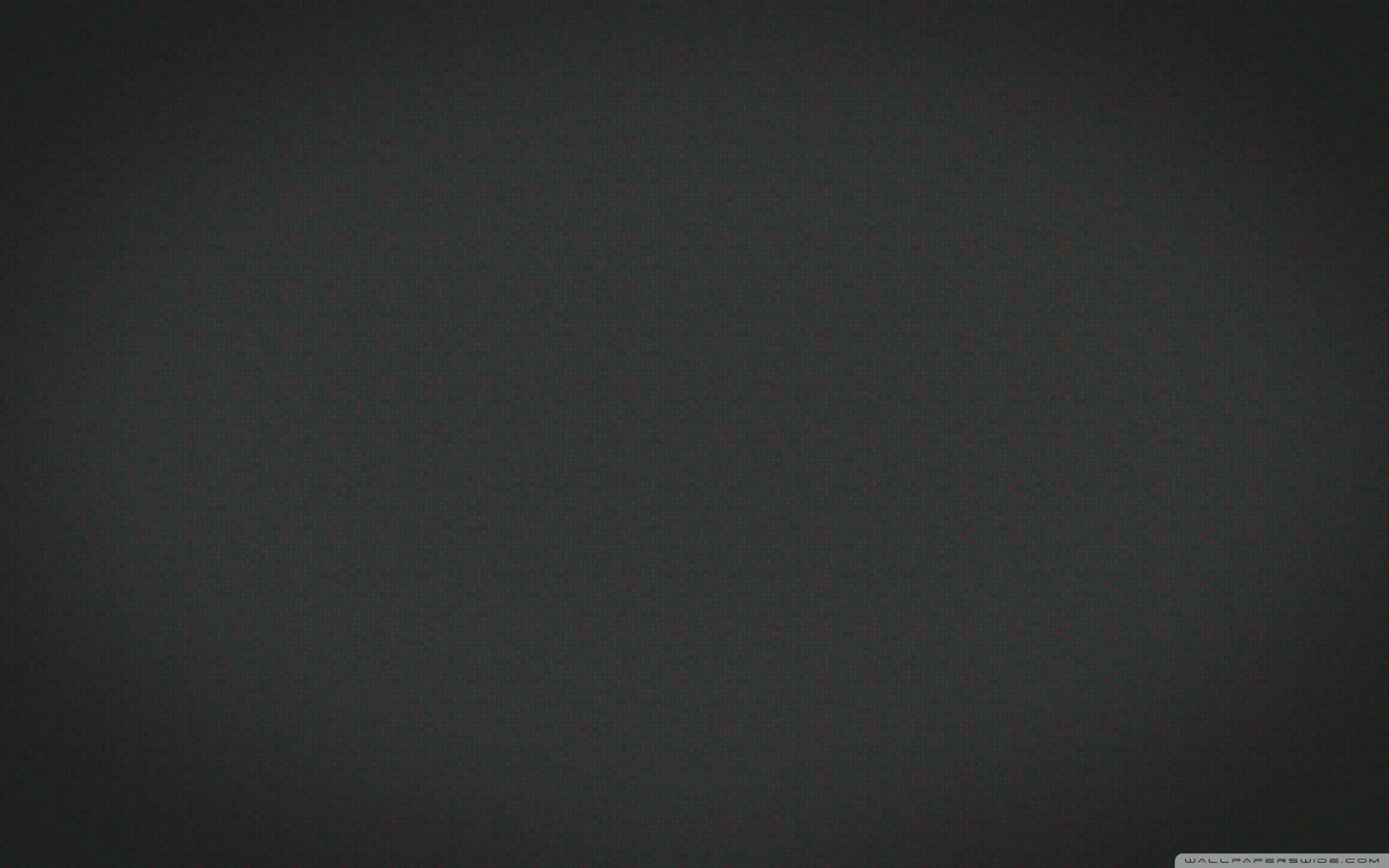 Grey Texture 桌布 壁紙 — 極簡深灰色漸變背景，帶有細微紋理和柔和光線。