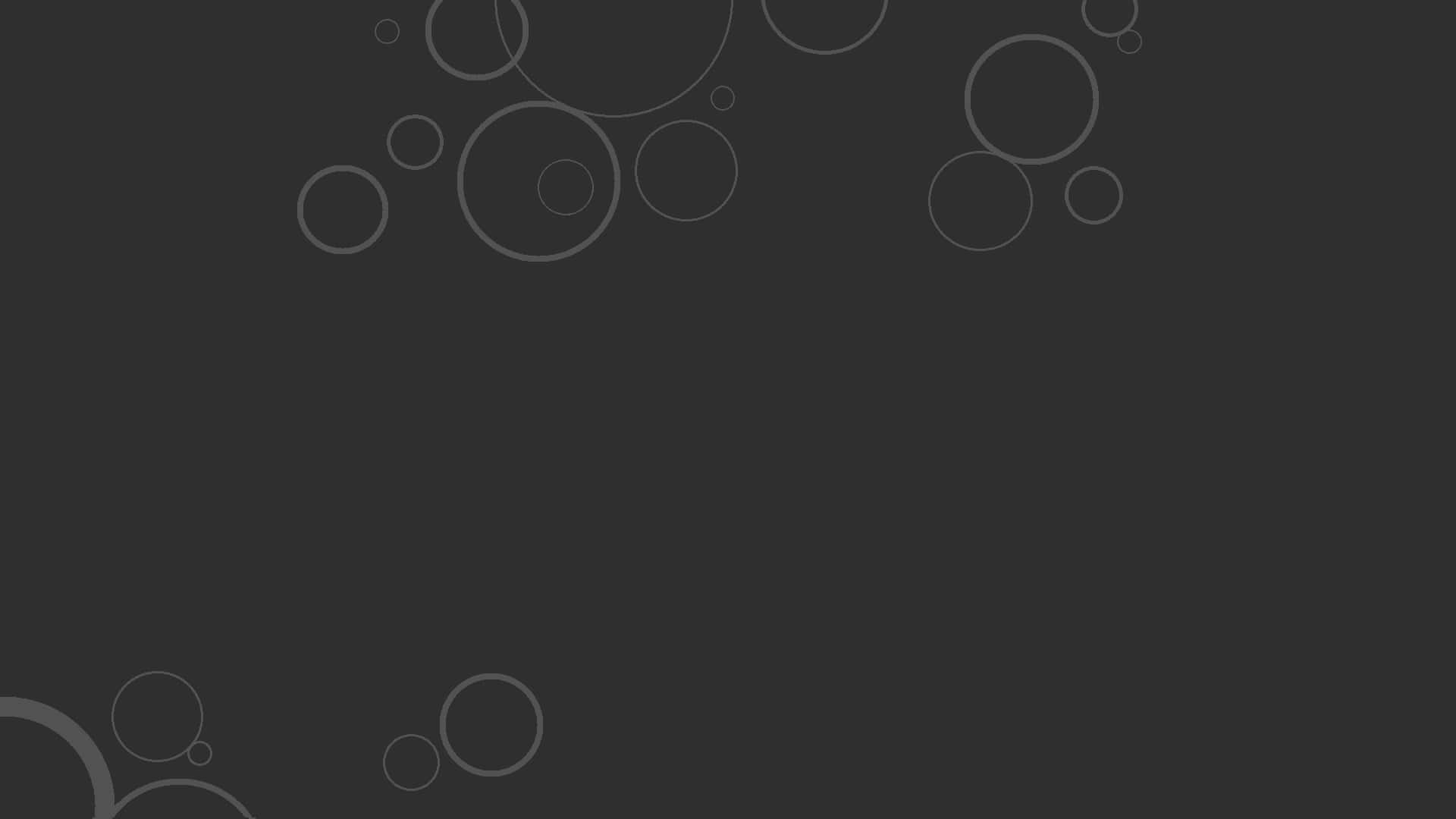 Black And Grey 桌布 壁紙 — 極簡深灰色背景，角落散落漂浮著淺灰色同心圓。