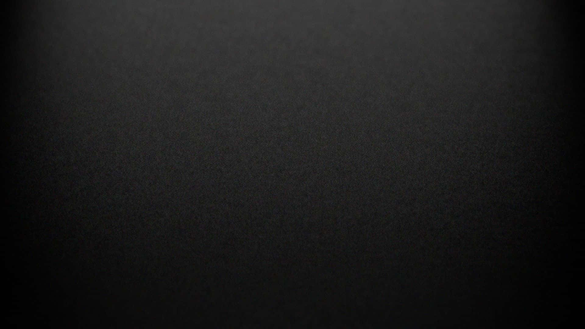 Black And Grey 桌布 壁紙 — 極簡深色紋理背景，帶有微妙漸變，邊緣漸變為黑色。